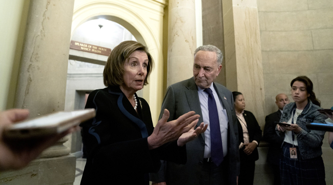 Nancy Pelosi and Chuck Schumer on June 23. (Stefani Reynolds/Bloomberg News)