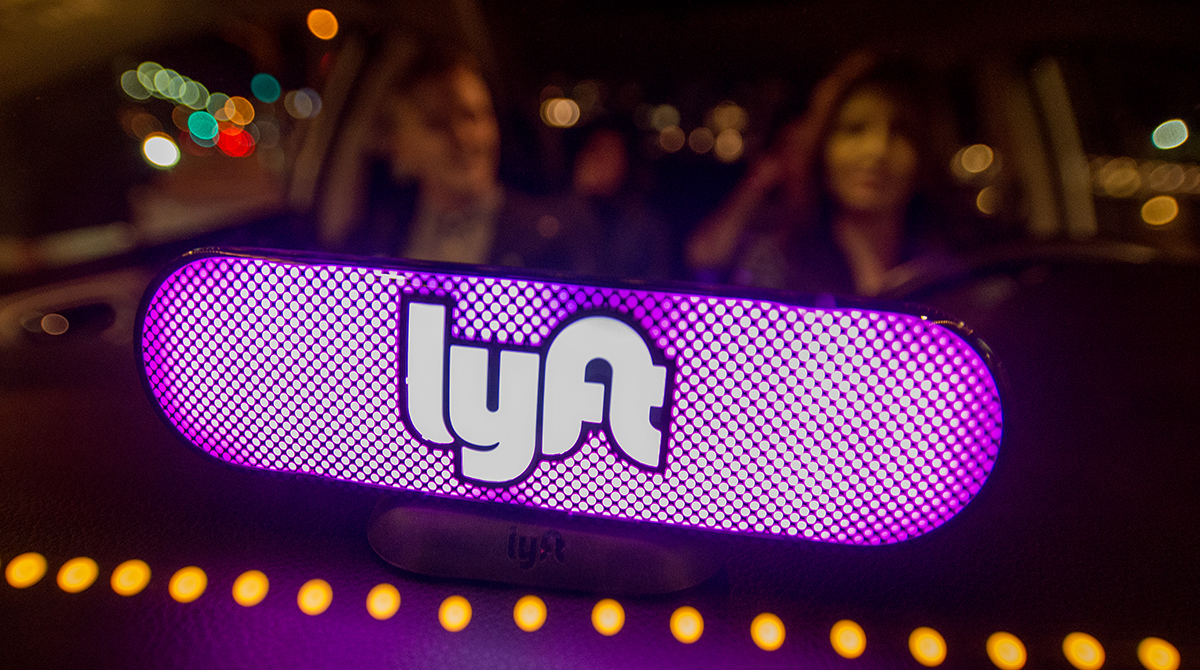 Lyft's new Amp glows on the dashboard of a car in San Francisco.