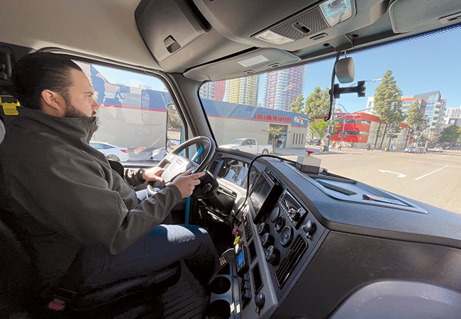 Driver Cesar Ortega demonstrates Hyzon's hydrogen fuel cell truck