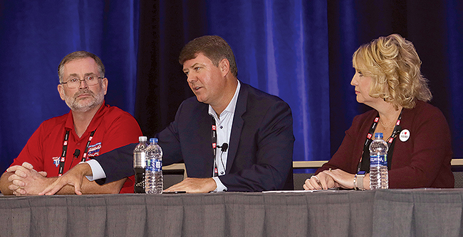 Jim Mullen (center) at an MCE panel in 2019. (John Sommers II for Transport Topics)