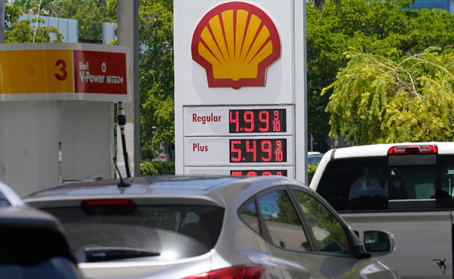 Cars line up for gas at a Shell station in Miami June 17. 