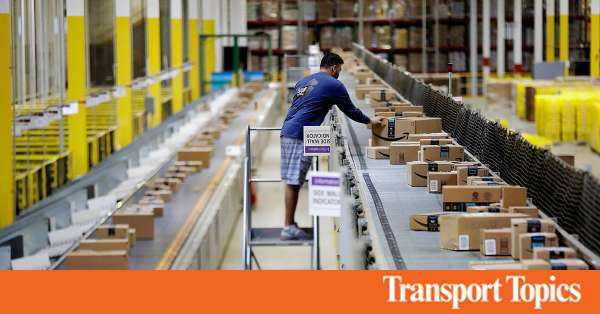 Hundreds Show Up for Jobs at  Warehouses in US Cities