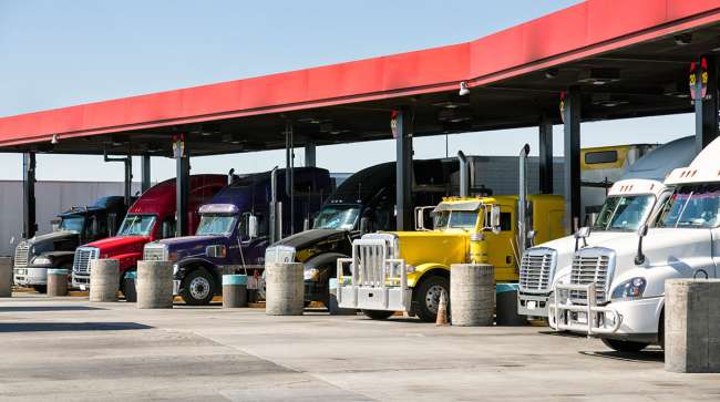 Trucks fueling at service station in California