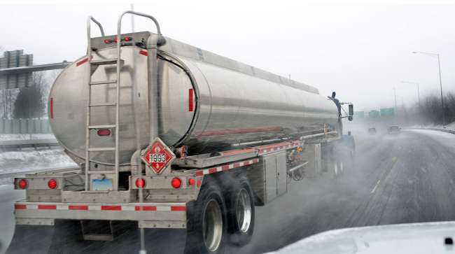 Fuel tanker on a highway in winter weather