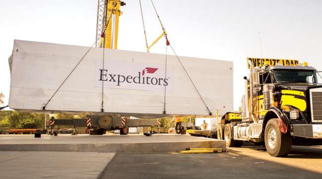 An Expeditors International container is lifted