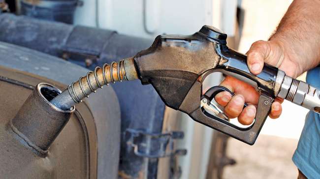 Getty image of a man pumping fuel