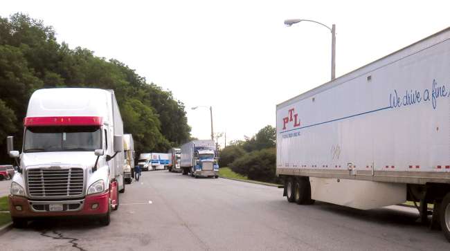 Trucks parked along highway