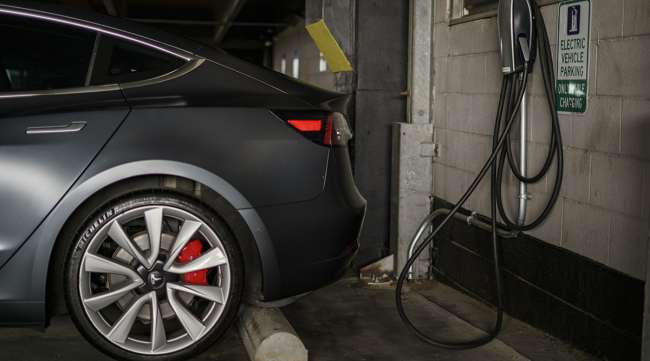 A Tesla vehicle charging