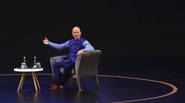 Amazon CEO Jeff Bezos sits during an event in New Delhi, India, on Jan. 15.