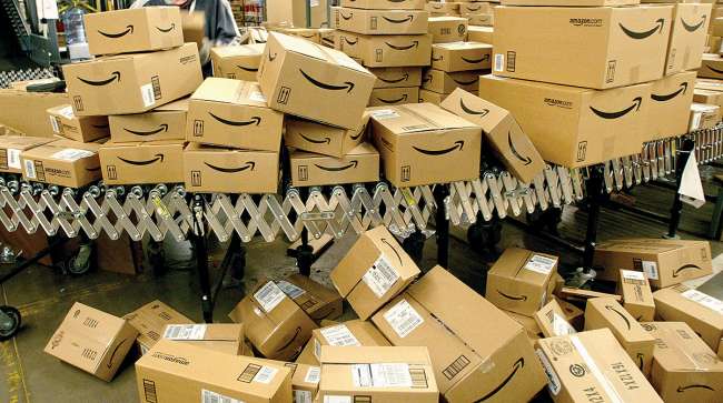 Amazon packages on conveyor belt
