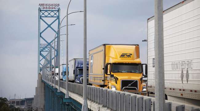 Truckers drive across the Ambassador Bridge