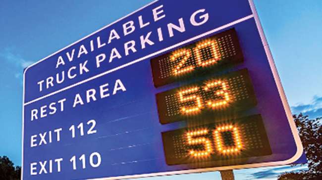 Digital truck parking sign showing available spaces
