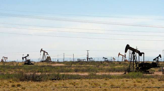 Oil rigs near Artesia, N.M. (Jeri Clausing/Associated Press)