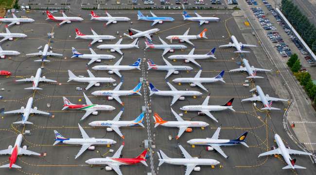 Boeing 737 Max planes are stored on employee parking lots in Seattle in June 2019.