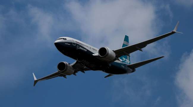 A Boeing 737 Max 7 jet flies during a demonstration in the U.K. in 2018.