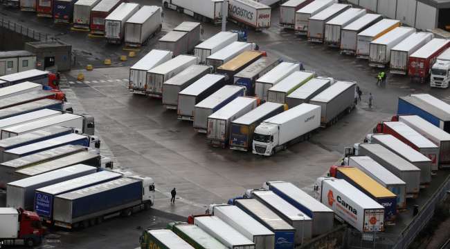Trucks sit parked outside the closed Port of Dover on Dec. 22. (Kirsty Wigglesworth/Associated Press)