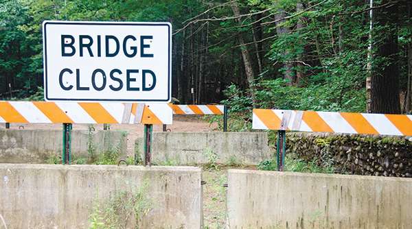 A sign indicating a bridge is closed