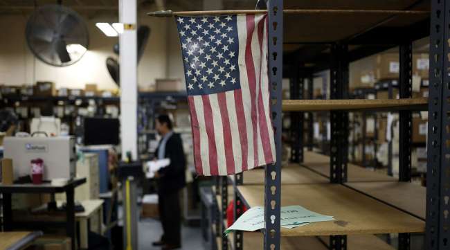 An American flag is displayed on a factory floor in Bowling Green, Ky.