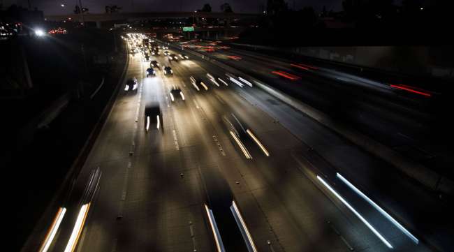 Vehicles drive in traffic down a California freeway in September 2019.