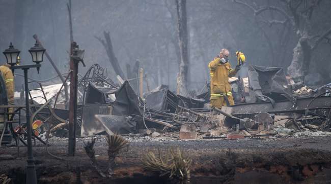 Firefighters in what is left of Paradise, Calif.