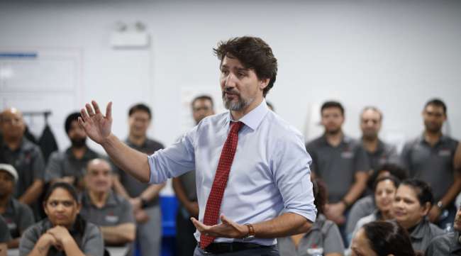 Canadian Prime Minister Justin Trudeau greets auto-parts workers at ABC Technologies in Ontario in January.