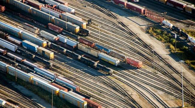 Freight trains and oil tankers sit in a rail yard in Toronto, Ontario.