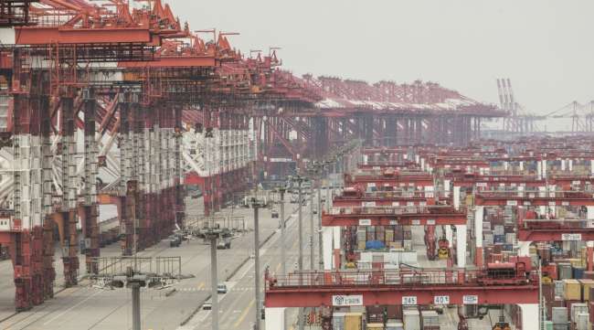 Container operations at the Yangshan Deep Water Port in Shanghai, China, on Feb. 4.