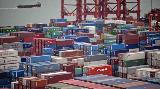 Containers sit in the Shekou Container Terminals in Shenzhen, China.