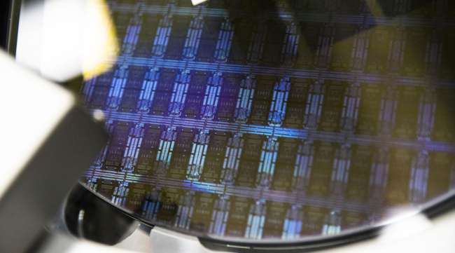 A wafer is processed in a semiconductor manufacturing facility in Malta, N.Y. (Adam Glanzman/Bloomberg News)