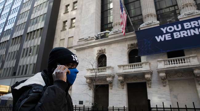 Man in mask outside NYSE
