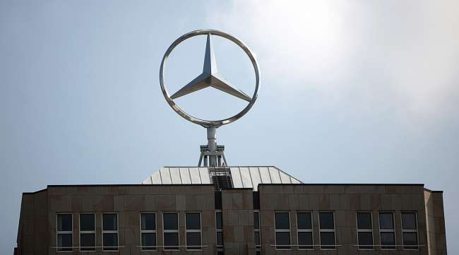 Daimler logo atop building