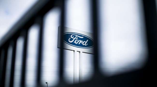 Signage is displayed outside the idled Ford Motor Co. Michigan Assembly plant in Wayne, Mich., on March 23.