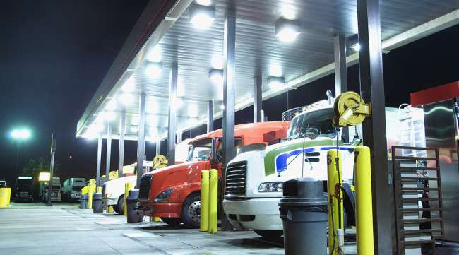 Trucks refueling at night