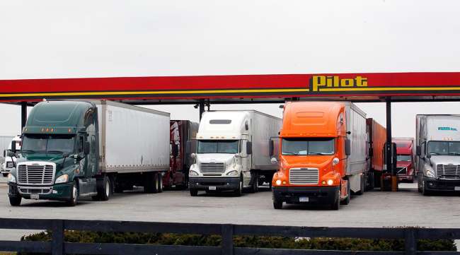 Trucks fueling up at a Pilot station
