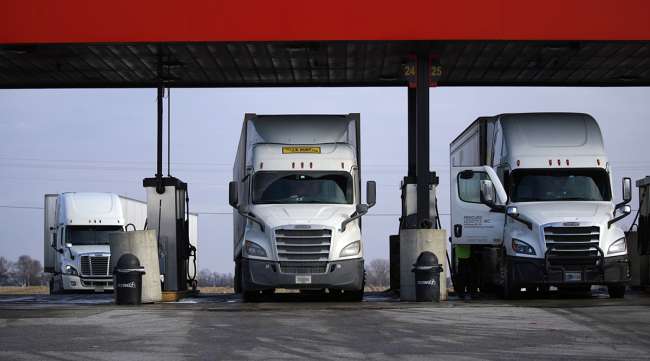 Trucks at a truck stop fuel pump in Whiteland, Ind.