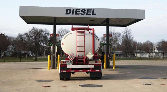A tanker truck parks at a diesel fuel pump at a Phillips 66 gas station in Princeton, Ill.