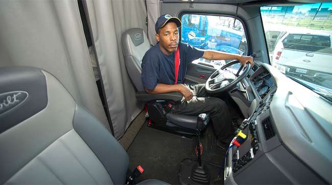 Driver in cab interior