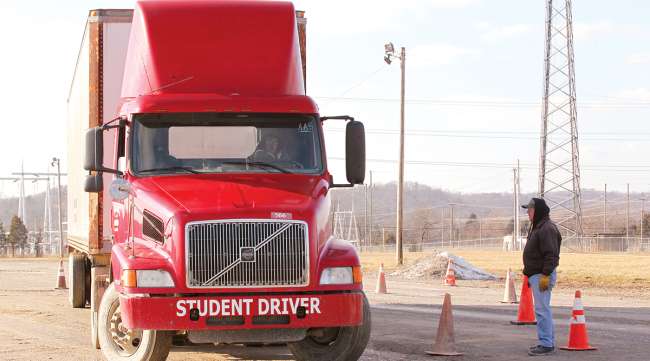 Truck Training America student driver practices behind the wheel