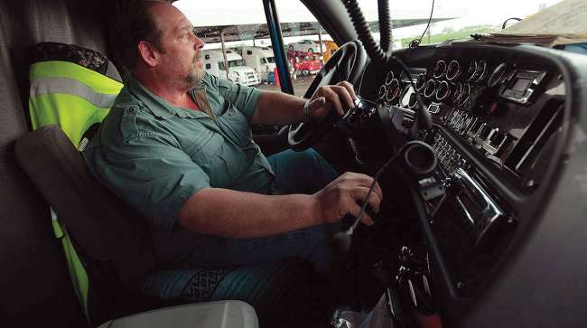 Truck driver behind the wheel
