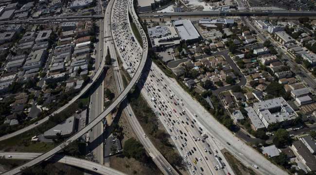 Vehicles sit in rush hour traffic at an interchange in Los Angeles.