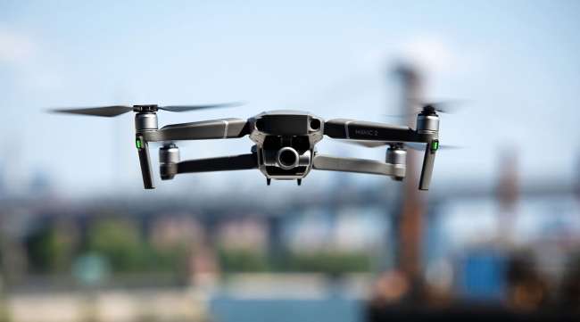 A DJI Technology Co. drone flies over Brooklyn in August 2018. (Mark Kauzlarich/Bloomberg News)