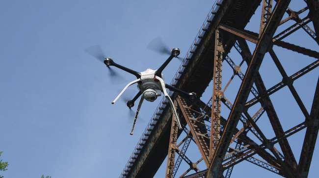 A drone inspects a bridge