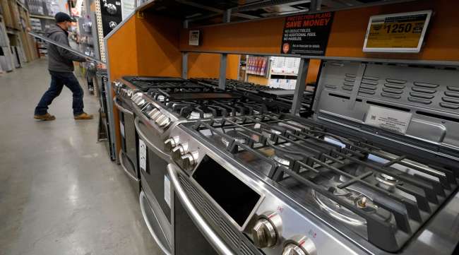 Stoves sit on a display at a Home Depot location in Boston. (Steven Senne/Associated Press)