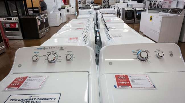 GE washing machines are displayed at a home appliance store in California.