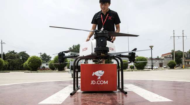 A JD.com Inc. drone during a package delivery demonstration at a launch pad in China. (Qilai Shen/Bloomberg News)