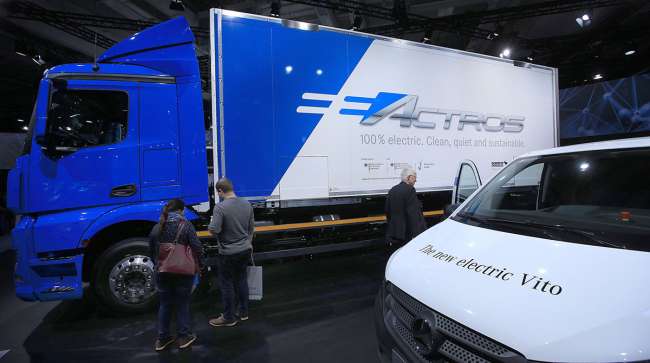 A Mercedes-Benz eActros electric cargo truck, left, and a Mercedes-Benz Vito electric van