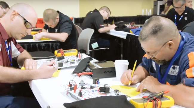 Technicians take exam at 2018 SuperTech competition