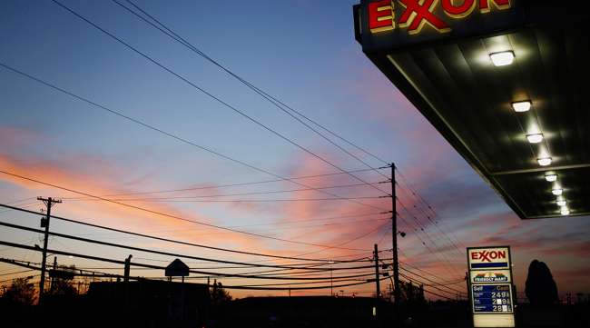 Exxon gas station as sun sets