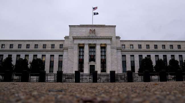 The Federal Reserve building is seen in Washington, D.C., on Dec. 1. (Stefani Reynolds/Bloomberg News)