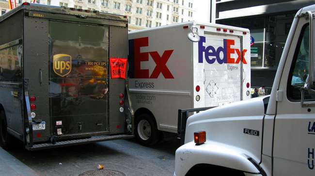 FedEx and UPS Trucks